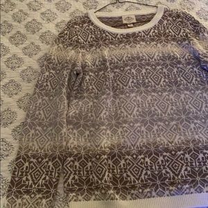 Sweater: blue tan and brown.